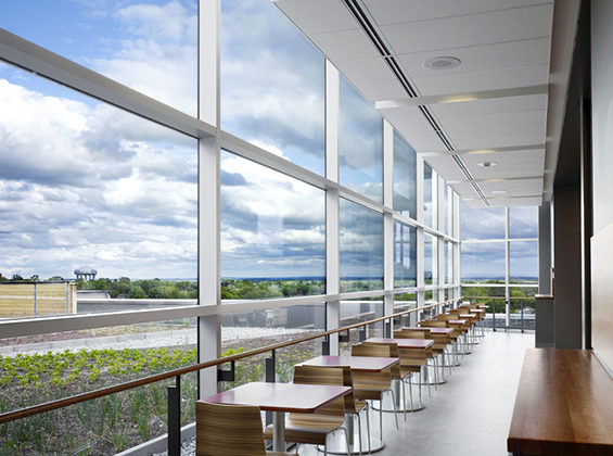 28186-O-01-M Modern space with large glass windows and seating