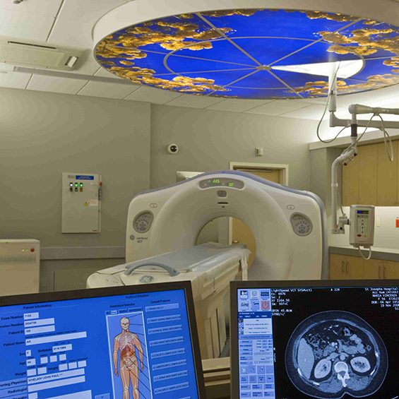 Modern Hospital Scanning Room with Monitors