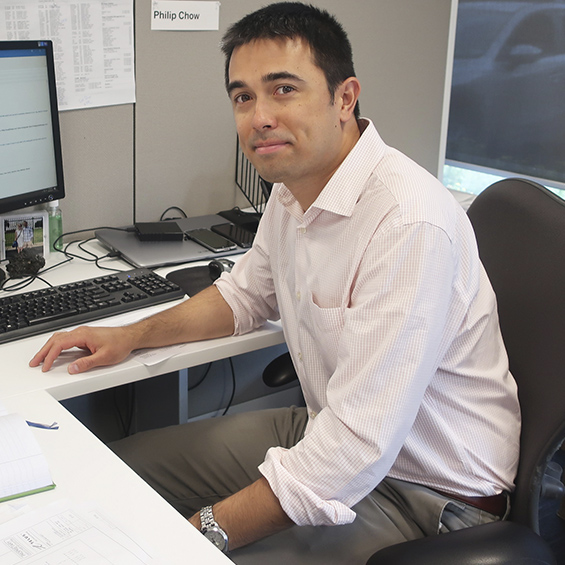Phil Chow working at his desk.