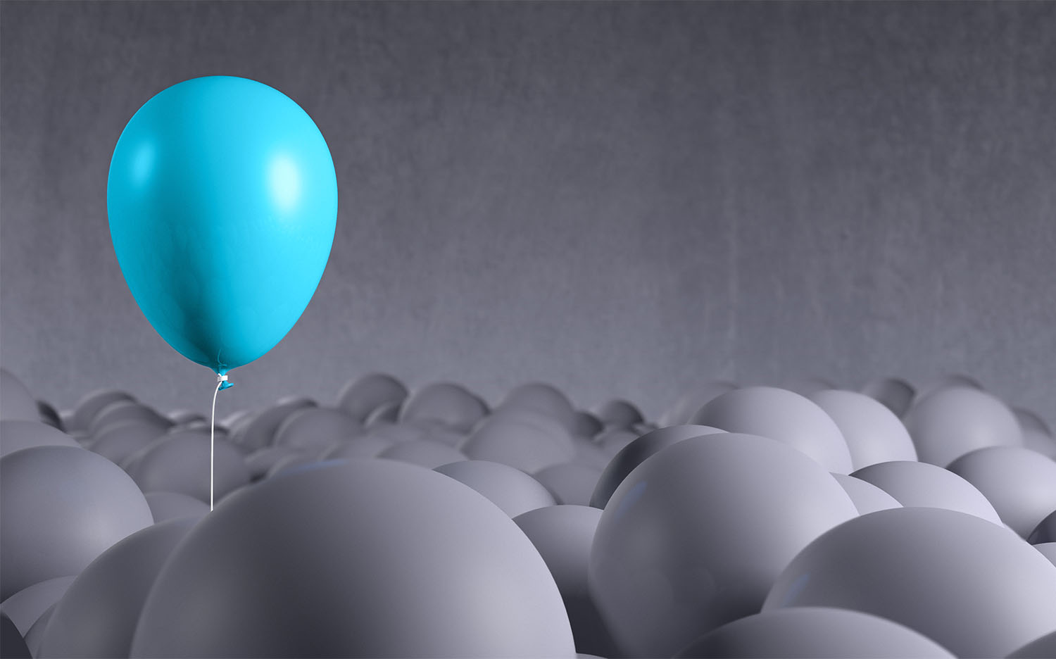 Blue balloon rising from gray background: individuality, standing out
