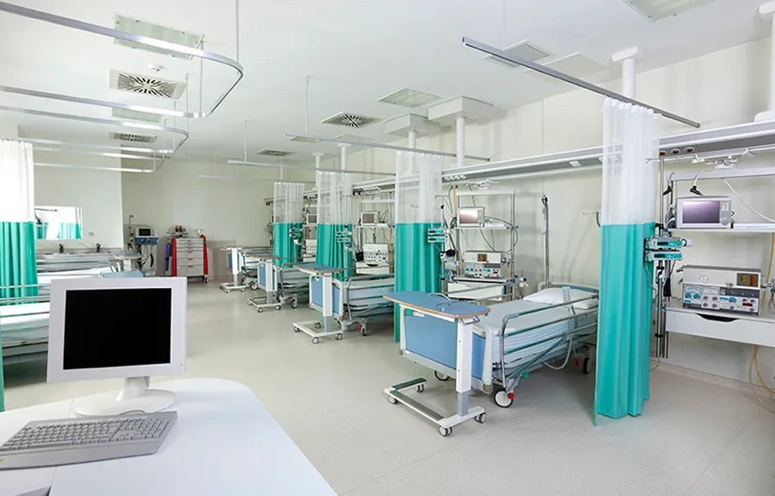 iStock-171253720-865x575-1-Resized.jpg Image of modern hospital patient room with beds
