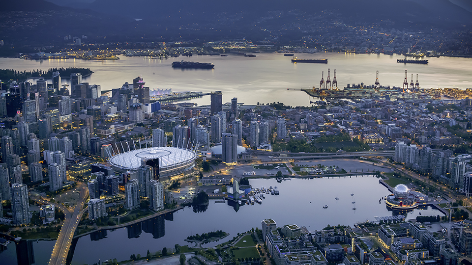 BC Place and Science World with cityscape Exterior of BC Place and Science World with modern cityscape and harbour, Vancouver, British, Columbia, Canada.