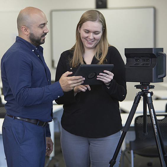 HH Angus employee using a Matterport scanner