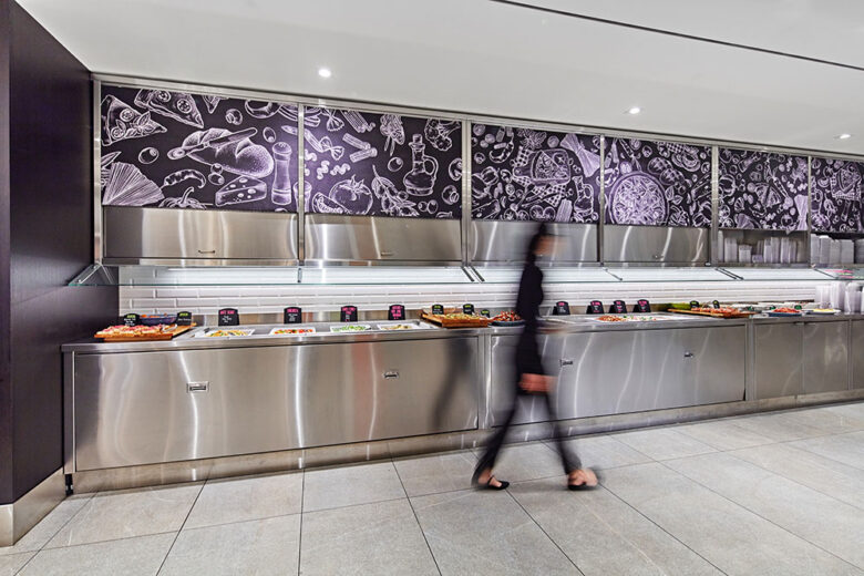 010A6706 Interior of long prep area with wall graphics