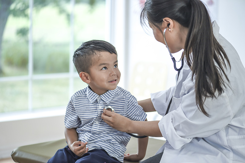 Photo of doctor and child