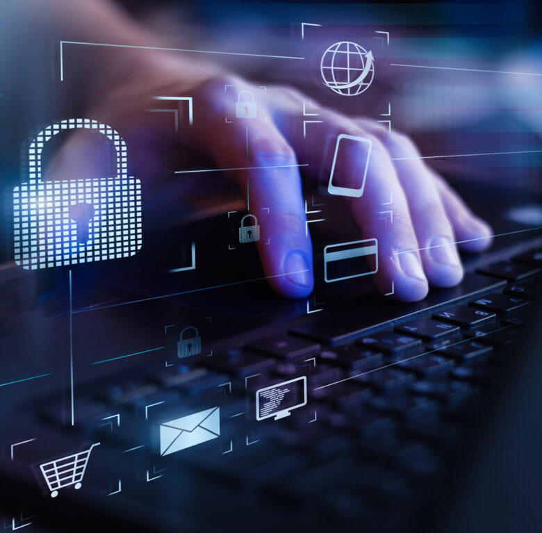 Data protection and secure online payments. Cyber internet security technologies and data encryption . Closeup view of man`s hand using laptop with virtual digital screen with icon of lock on it. Data protection and secure online payments. Cyber internet security technologies and data encryption . Closeup view of man`s hand using laptop with virtual digital screen with icon of lock on it.