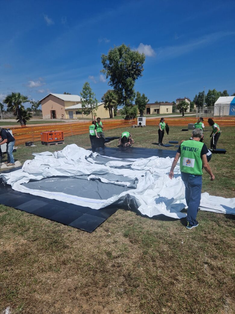 CCE_HHAngus_MKGU8219 Image of tent being deployed