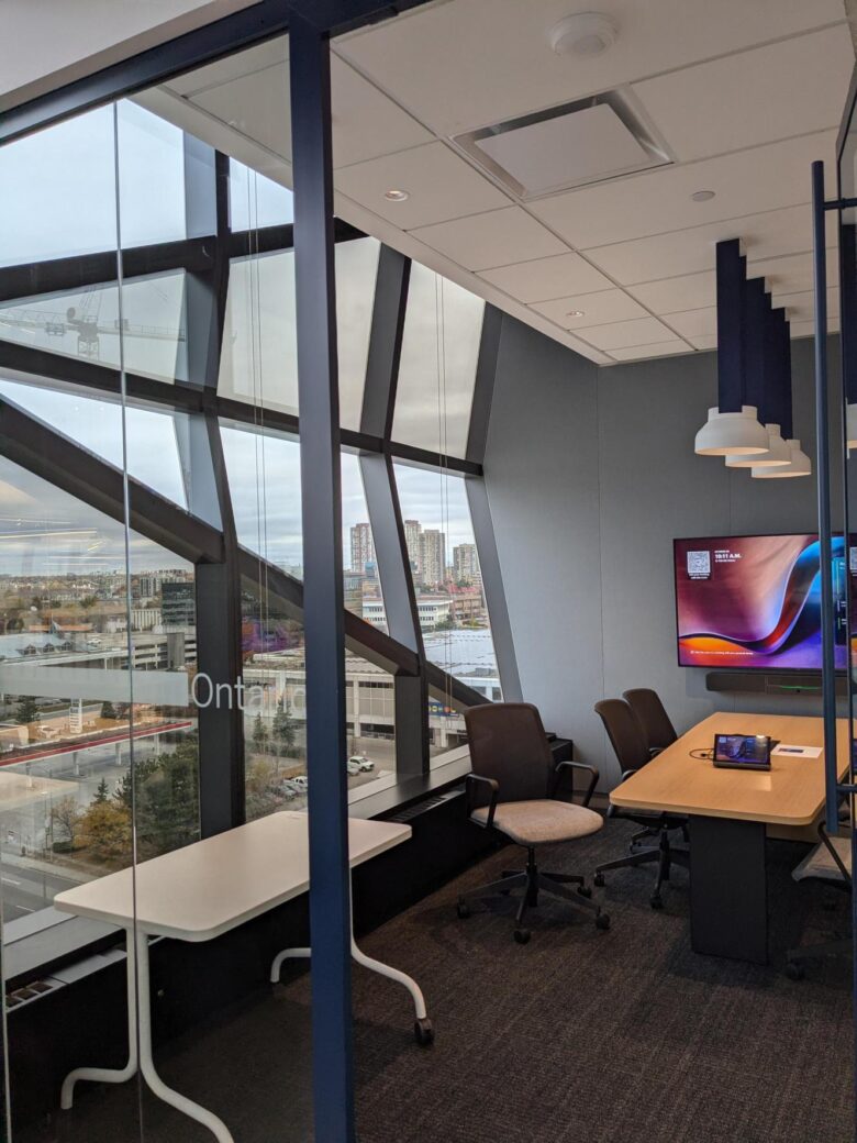 Image of HHA Toronto office interior meeting room with screen 
