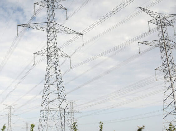 Electrical transmission tower, power lines.